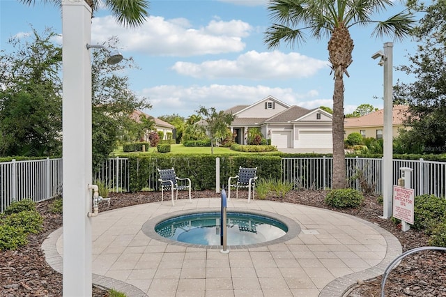 view of pool featuring a hot tub