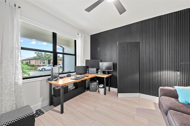 office featuring ceiling fan and light wood-type flooring