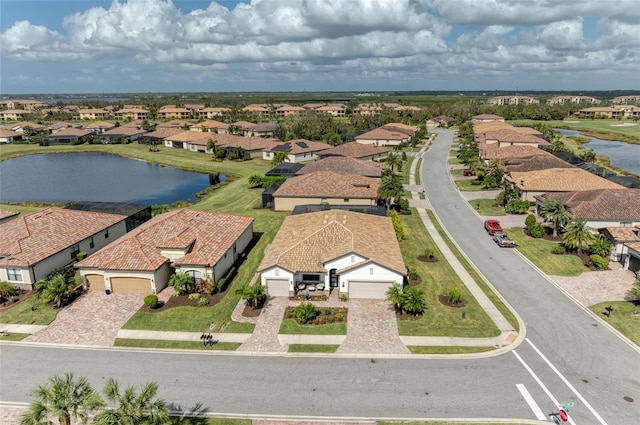 drone / aerial view with a water view