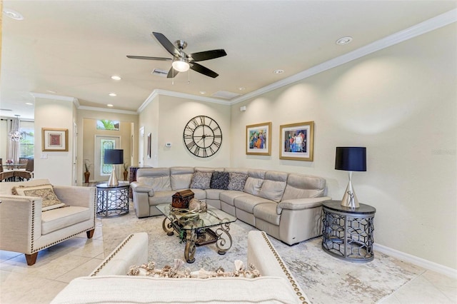 living room with ceiling fan, light tile patterned floors, and ornamental molding