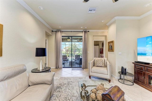 living room with ornamental molding and light tile patterned floors