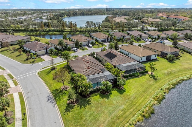 drone / aerial view featuring a water view