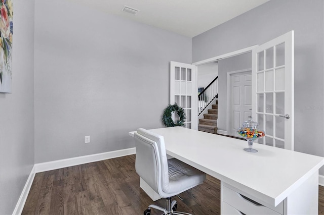 office with dark wood-type flooring