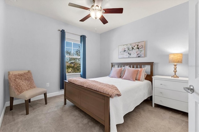 bedroom with light carpet and ceiling fan