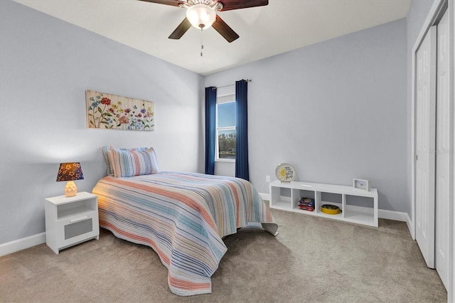 bedroom with light carpet, a closet, and ceiling fan