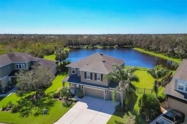 birds eye view of property featuring a water view