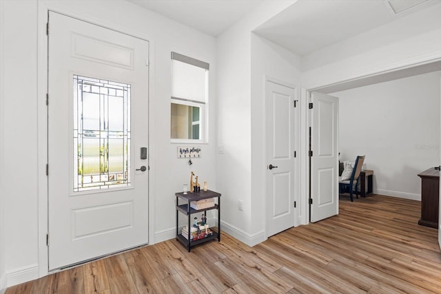 foyer with light hardwood / wood-style flooring