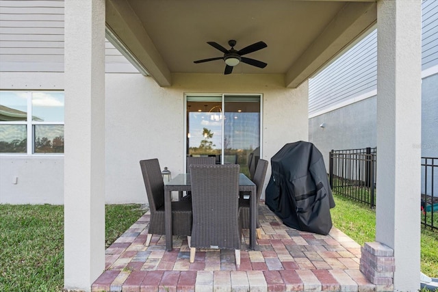 view of patio with ceiling fan