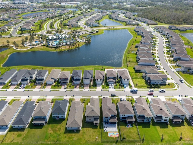 drone / aerial view with a water view