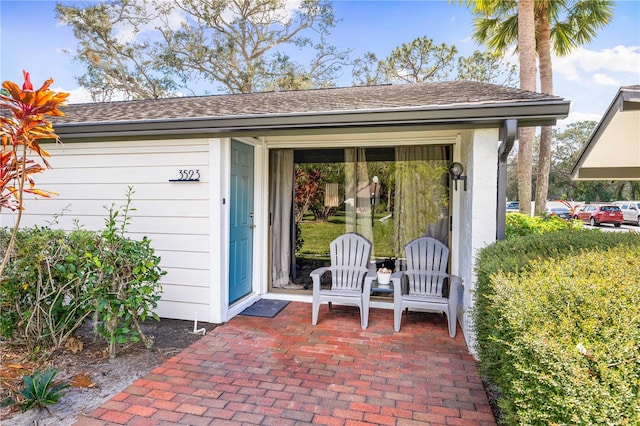 property entrance featuring a patio