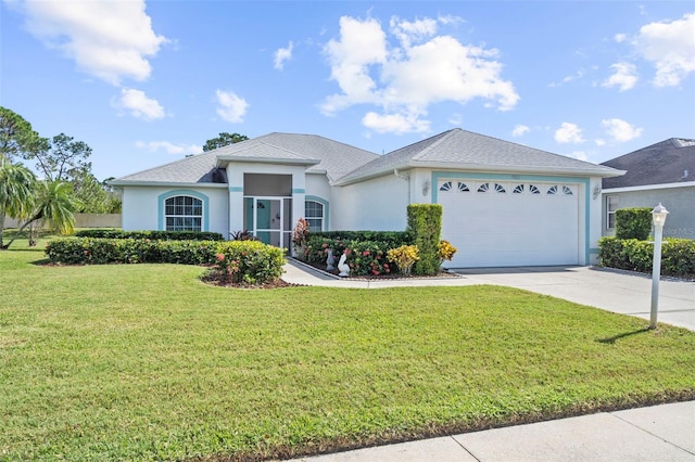 ranch-style home featuring a front yard and a garage