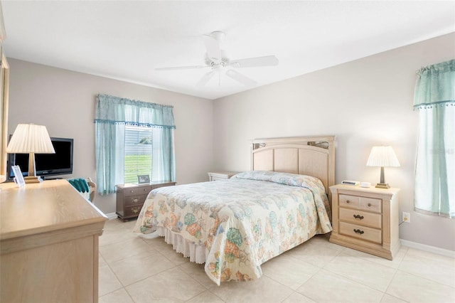 tiled bedroom with ceiling fan