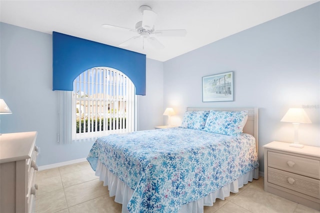 bedroom featuring ceiling fan and light tile patterned floors