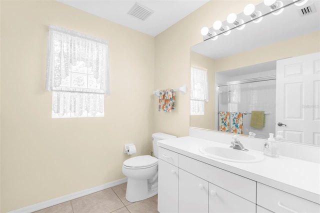 bathroom featuring vanity, toilet, tile patterned flooring, and a shower with shower curtain