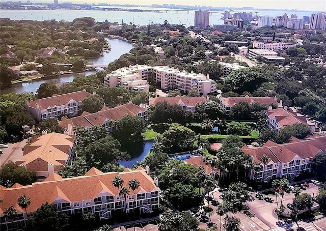 drone / aerial view with a water view