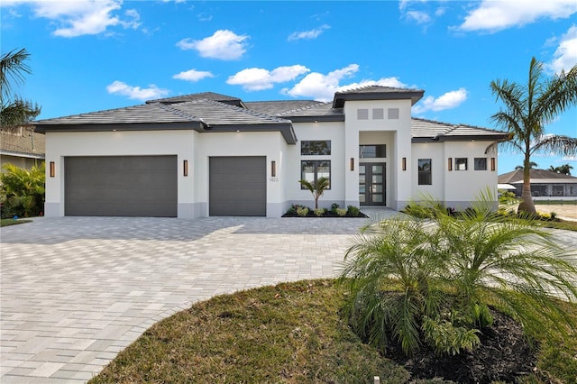 prairie-style house featuring a garage