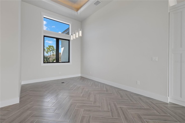 spare room featuring light parquet flooring