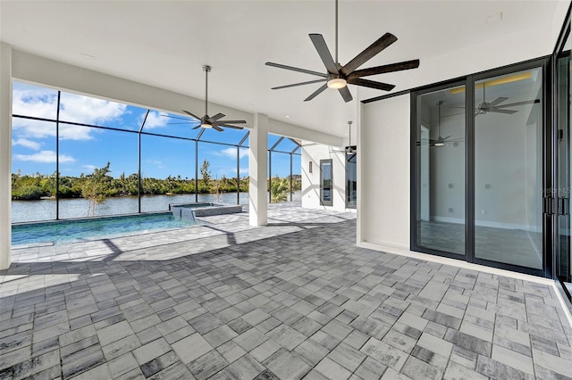 view of pool featuring a water view, ceiling fan, a lanai, and a patio area