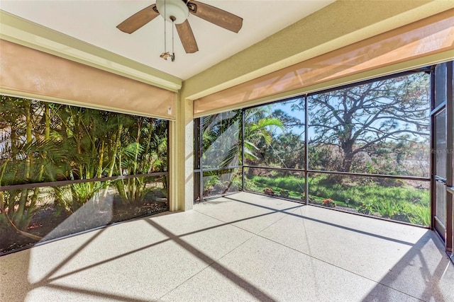 1269 Backspin Dr, Englewood, FL 34223 - unfurnished sunroom with ceiling fan