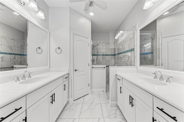 1269 Backspin Dr, Englewood, FL 34223 - full bath with marble finish floor, a sink, ceiling fan, and tiled shower