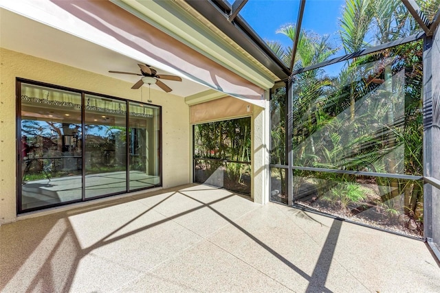 1269 Backspin Dr, Englewood, FL 34223 - unfurnished sunroom with a ceiling fan