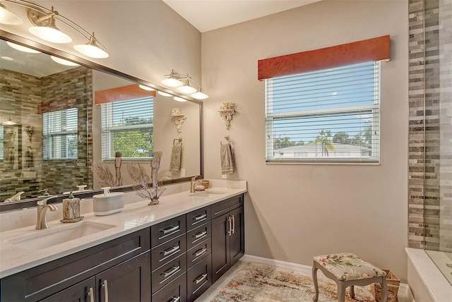 bathroom featuring vanity and a tile shower