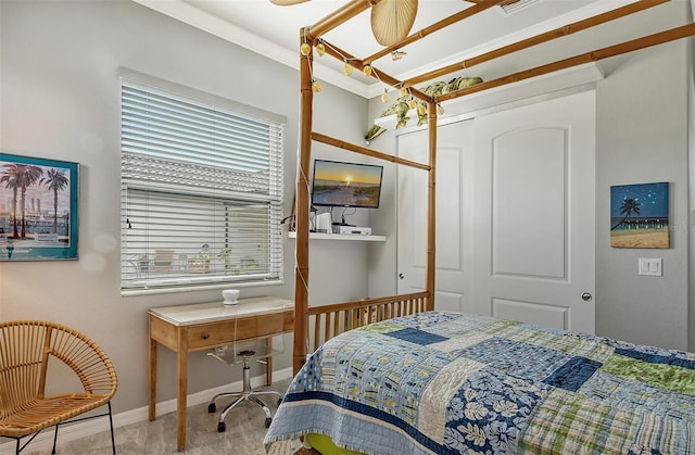 bedroom with multiple windows and ornamental molding