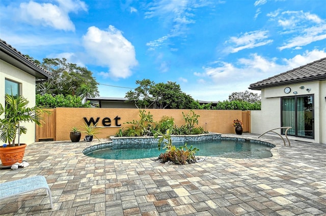 view of swimming pool featuring a patio