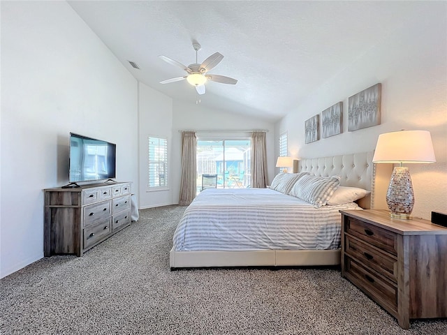 carpeted bedroom with access to exterior, a ceiling fan, baseboards, lofted ceiling, and visible vents
