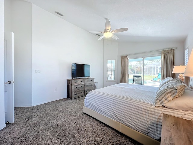 carpeted bedroom featuring visible vents, lofted ceiling, baseboards, ceiling fan, and access to outside