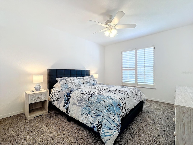 carpeted bedroom with baseboards and ceiling fan