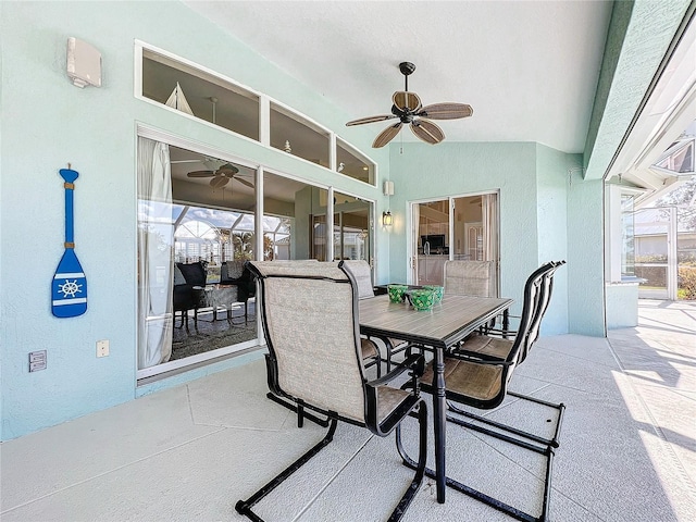 view of patio / terrace featuring outdoor dining area and ceiling fan