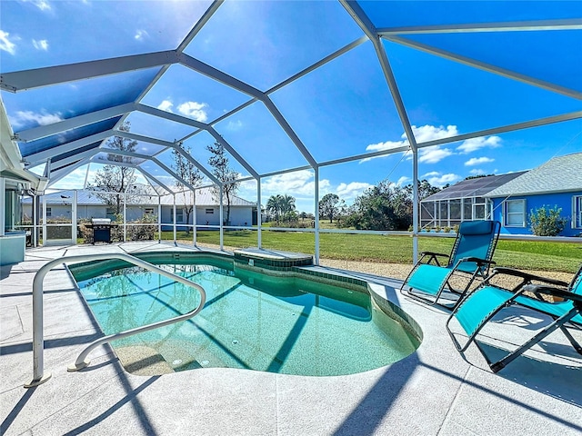 view of swimming pool featuring a lawn, a patio, and glass enclosure