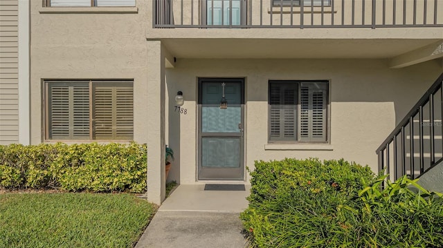 doorway to property with a balcony