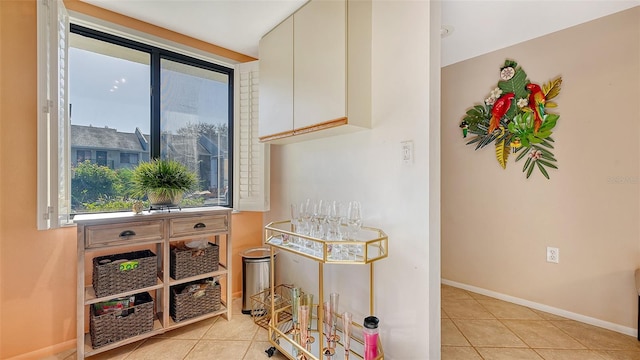 interior space with tile patterned floors