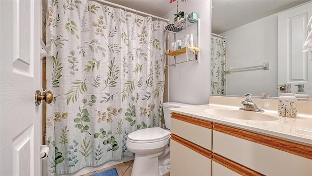 bathroom with vanity, toilet, tile patterned flooring, and a shower with shower curtain