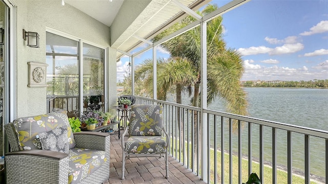 sunroom with a water view