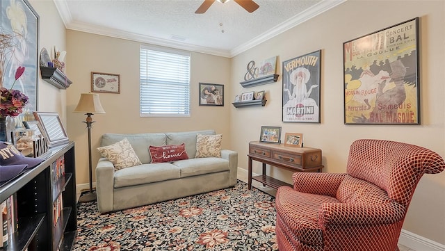 living room with crown molding, a textured ceiling, and ceiling fan