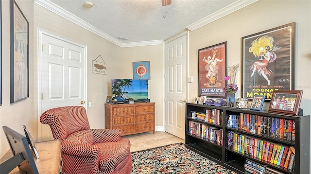 sitting room with crown molding, a textured ceiling, and light tile patterned flooring