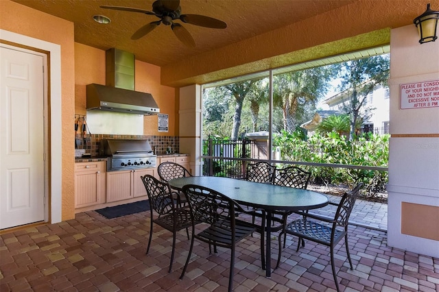 dining space with a textured ceiling and ceiling fan