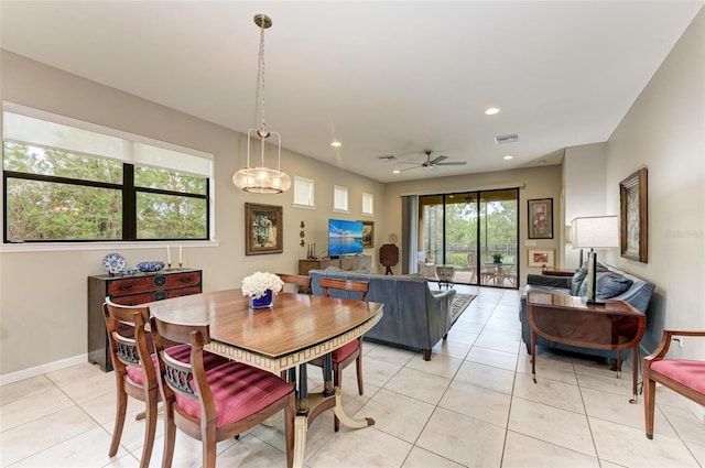 dining room featuring ceiling fan and light tile patterned flooring