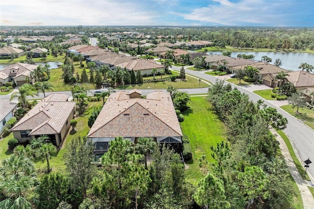 drone / aerial view with a water view