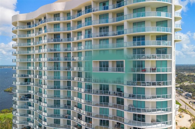 view of building exterior featuring a water view