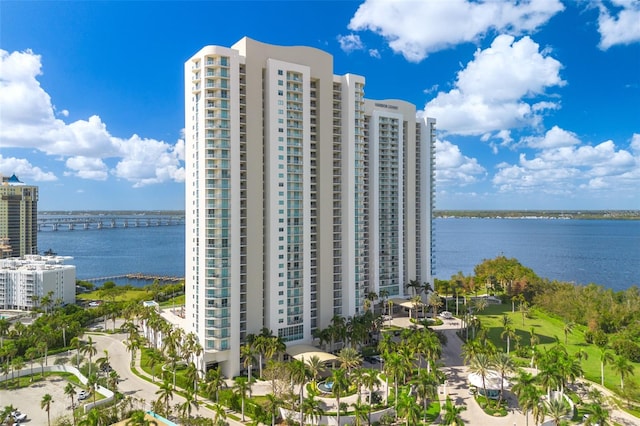 view of building exterior with a water view