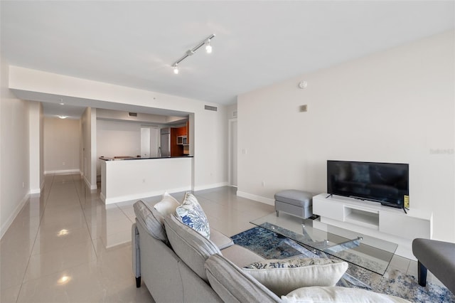 tiled living room with track lighting