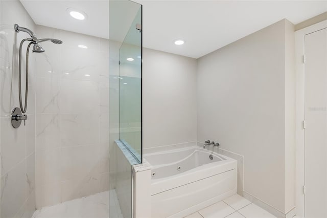 bathroom featuring tile patterned flooring and plus walk in shower