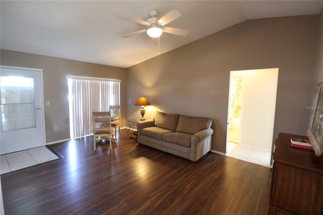 4105 33rd Avenue Dr W Unit 4105, Bradenton, FL 34205 - living area with ceiling fan, vaulted ceiling, wood finished floors, and baseboards