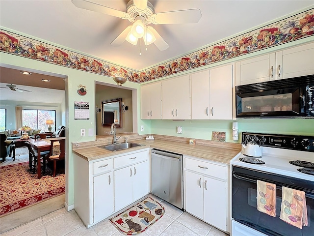 kitchen featuring light tile patterned flooring, sink, electric stove, stainless steel dishwasher, and white cabinets