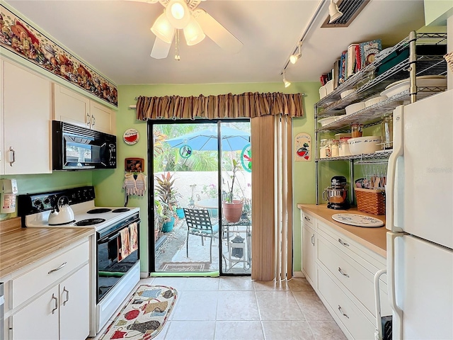 kitchen featuring track lighting, light tile patterned floors, white cabinetry, white appliances, and ceiling fan