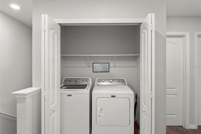 washroom with separate washer and dryer